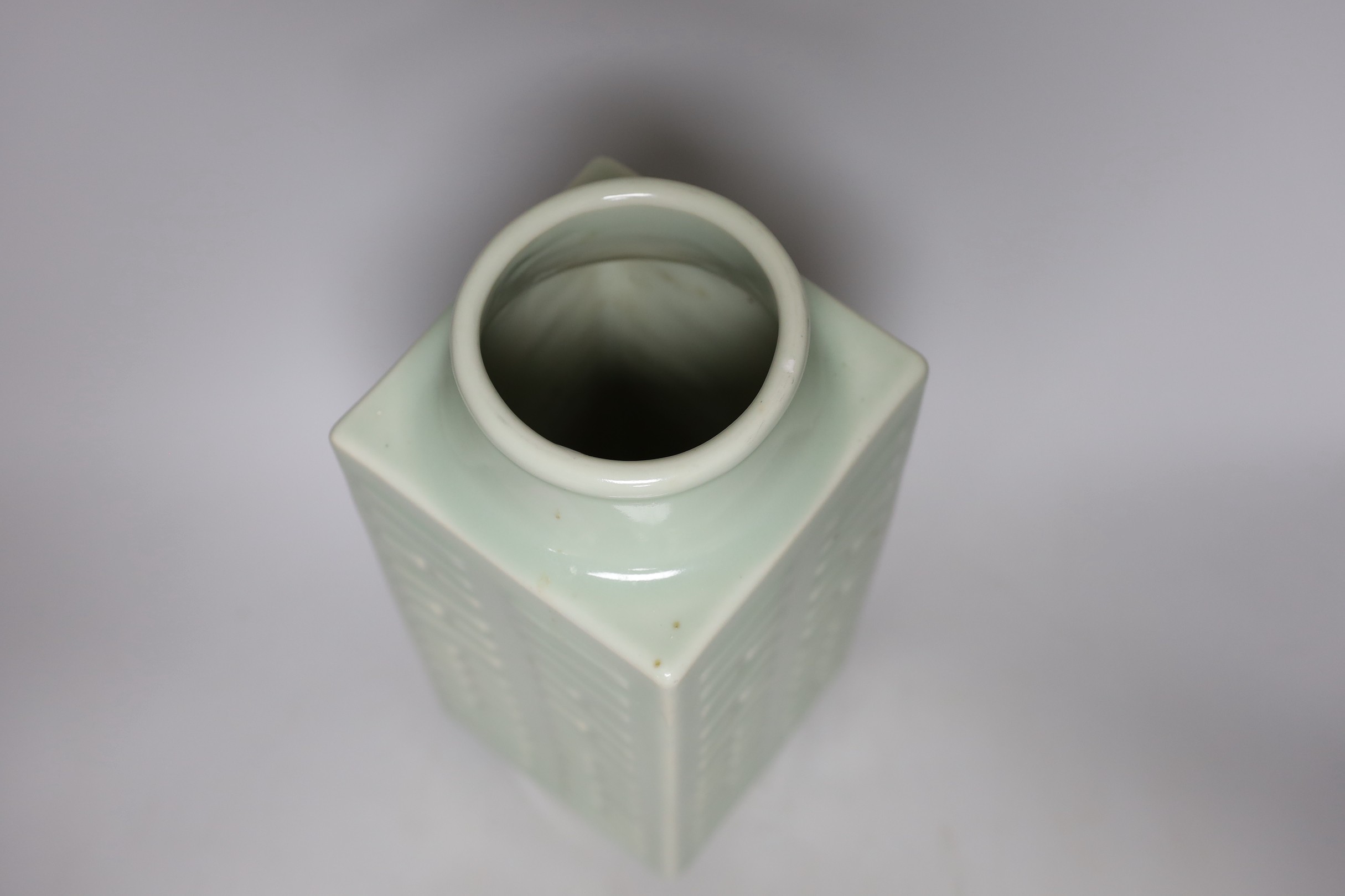 A square Chinese celadon-glazed 'cong' style vase, 30cm tall